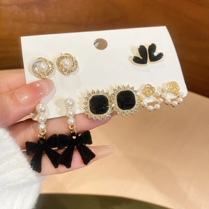 Detailed set of 5 pairs including golden flower pearls and black bowknot stud earrings
