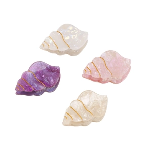 Pearlescent shell-shaped hair claws in purple, pink and white with gold accents