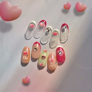 Pastel jelly press-on nails set with 3D peach charms, crystal hearts and Love script