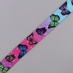 Close-up of vibrant butterfly pattern neck lanyard with colorful gradient webbing texture