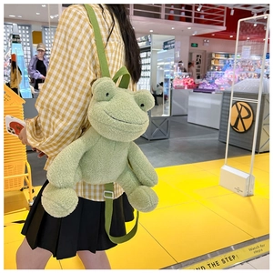 Detailed view of the cute plush frog backpack with soft texture and adjustable straps