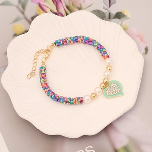 Bohemian colorful heishi beads bracelet with heart charm and golden lobster clasp