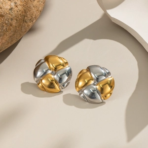 Two-tone gold and silver braided geometric stud earrings with high polished metal finish
