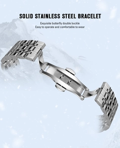 Close-up of polished stainless steel watch band featuring a secure butterfly double buckle