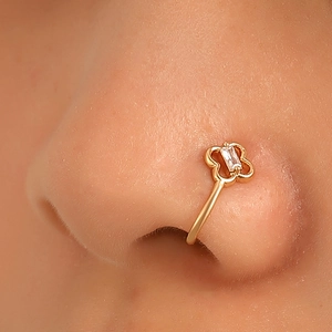 U-shaped gold nose clip with a four-leaf clover design and rectangle zircon stone