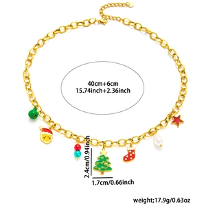 Detail of gold Christmas necklace with festive charms and precise size measurements