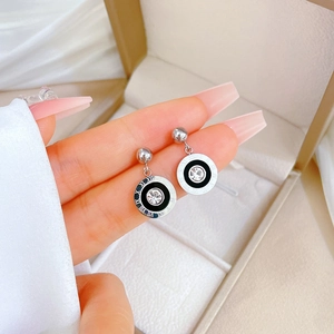 Titanium steel roman numeral earrings with sparkling crystal center in silver finish