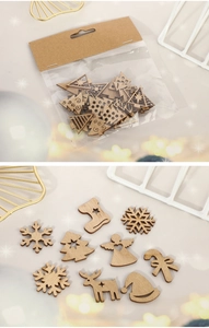 Flat lay of assorted natural wood Christmas ornaments including snowflakes and trees
