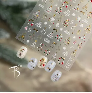 Detailed 3D Christmas nail stickers with gold embossed trees, bells, and stars