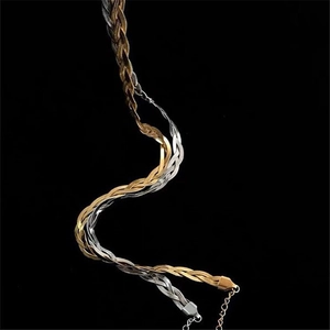 Three-tone braided snake bone necklace in gold, silver, and rose gold finishes