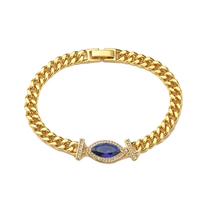Gold Cuban chain bracelet featuring a marquise-cut navy blue stone and pavé zircon accents