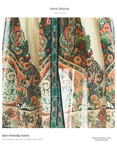 Close-up of lightweight chiffon fabric featuring a vintage paisley floral print pattern