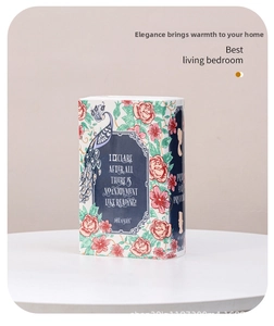 Detailed view of book-shaped ceramic vase featuring Pride and Prejudice vintage artwork