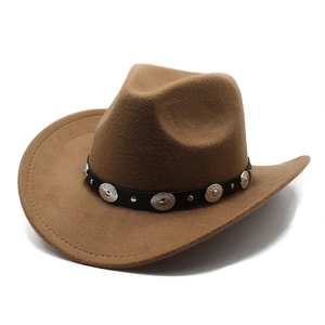 Detail of brown wool fedora with leather band and vintage silver metal studs