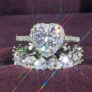 Sparkling heart halo ring set with cubic zirconia stones in elegant velvet jewelry box