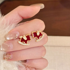 18K gold plated rocking horse earrings set with red and gold crystals in traditional style