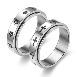 Polished titanium steel spinner ring with engraved cross and turtle patterns for anxiety
