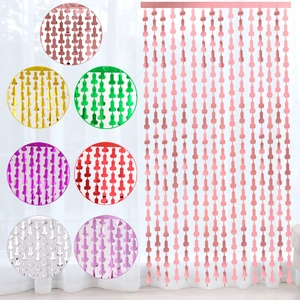 Adult party fringe curtain featuring rose gold penis shaped foil strands for bachelorette fun