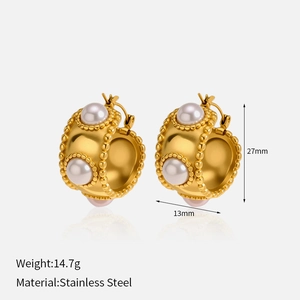 Detailed view of gold stainless steel hoop earrings with white pearls and 27mm height dimensions