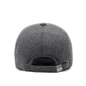 Rear view of dark grey winter baseball cap with thick tweed texture and metal buckle