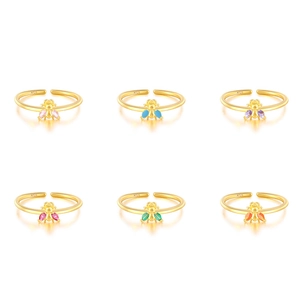 Macro shot of S925 sterling silver bee rings with colorful zircon inlaid on wings