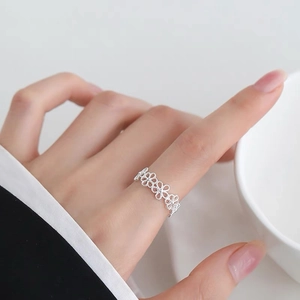 Elegant hollow floral silver ring with minimalist adjustable open band design for women