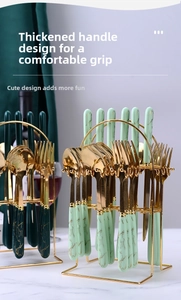 Detail of marble pattern handles and golden stand for 24-piece stainless steel cutlery set