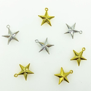Golden and silver plastic star tree toppers for Christmas decoration on white background