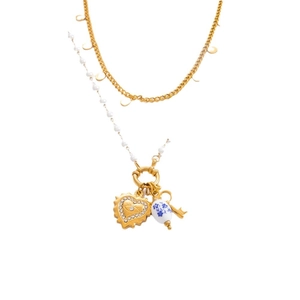Layered 18K gold-plated necklace with moon charms, pearl beads and heart pendant