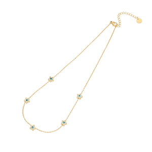 Gold star necklace with blue evil eye charms and fine chain on white background