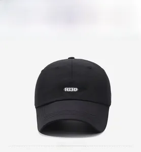 Detail of Boston 1630 3D embroidery on a black breathable mesh baseball cap