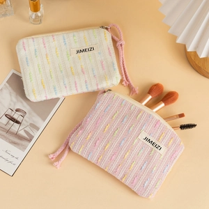 Chic woven makeup bag set with rainbow embroidery and cotton rope zipper pull