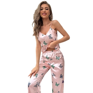 Women's pink silk satin pajamas set with colorful butterfly print and camisole top