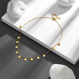 Minimalist gold stainless steel necklace with multiple heart pendants and extension chain