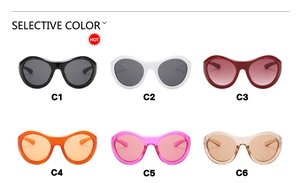 Selection of futuristic Y2K wraparound sunglasses in six vibrant glossy color options