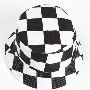 Detail shot of black and white checkerboard bucket hat with reinforced brim stitching