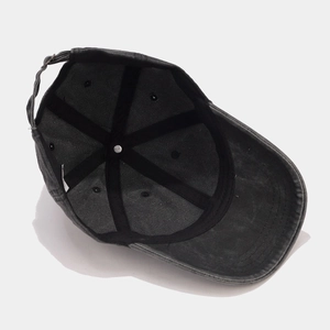Detailed interior of the distressed baseball cap showing cotton stitching and sweatband