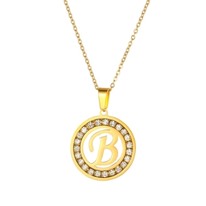 Close-up of gold stainless steel necklace with round crystal pavé letter B pendant