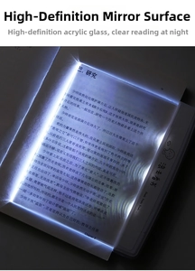 Flat panel LED reading light showing side-lit illumination on book pages in dark