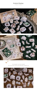 Detail showing vintage magic theme stickers including owl, potion bottle and wax seal