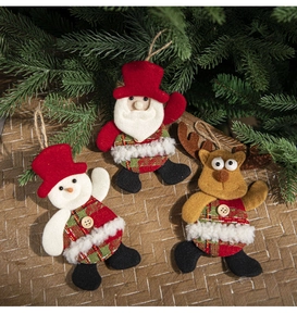 Close-up of handmade felt Christmas ornaments with Santa, Reindeer and Snowman patterns