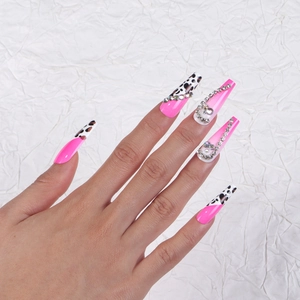 Long coffin press-on nails with hot pink polish, leopard print and luxury rhinestones
