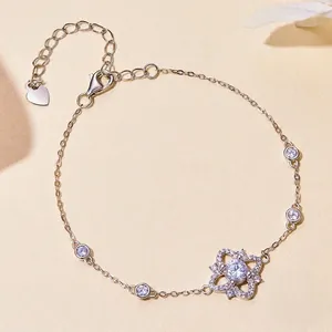 Luxurious S925 sterling silver bracelet featuring a flower charm and sparkling moissanite