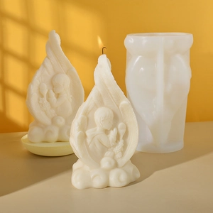 DIY silicone mold for angel and feather candles with a matching plaster relief design