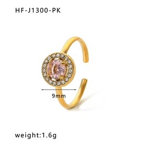 Detail view of 9mm pink zircon inlay on a gold-plated stainless steel open ring