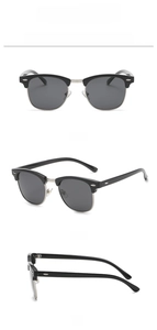 Detaillierte Ansichten der klassischen Halbrand-Sonnenbrille in Schwarz-Silber mit Gläsern
