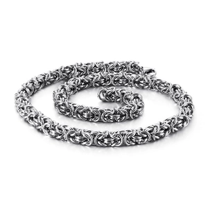 Polished stainless steel byzantine link chain necklace with lobster clasp on white background