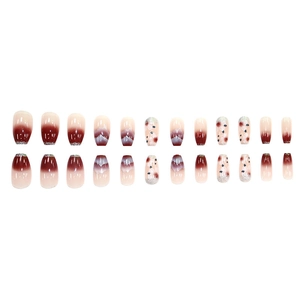 Pink gradient press-on nails with silver glitter and floral patterns in 24-piece set