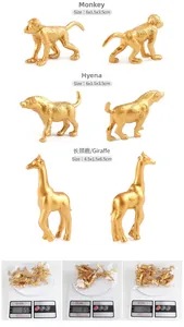 Dettagli di figurine di animali dorate in plastica con finitura metallica e peso
