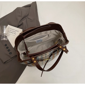 Top view of spacious large-capacity plaid tote bag showing interior zip compartments